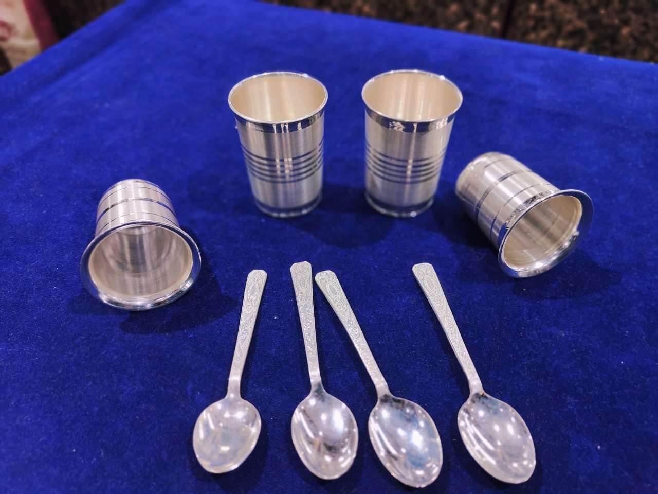 silver spoons and glasses