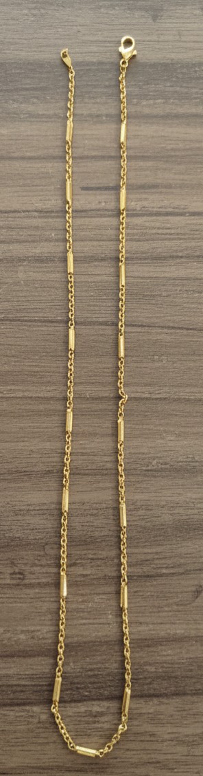 Gold corving necklace