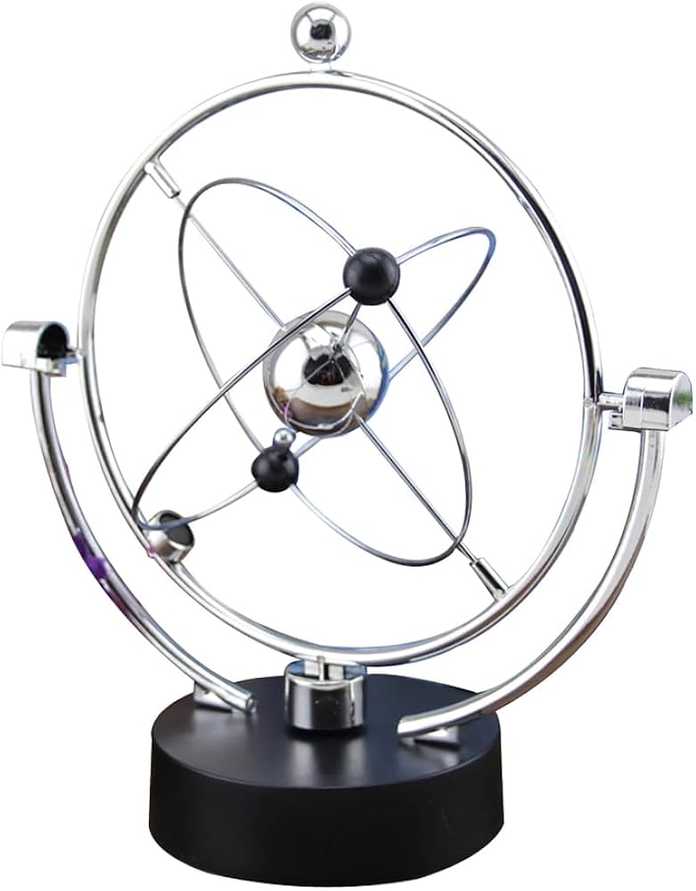 kinetic art perpetual motion desk toy, often themed around celestial or planetary motion.