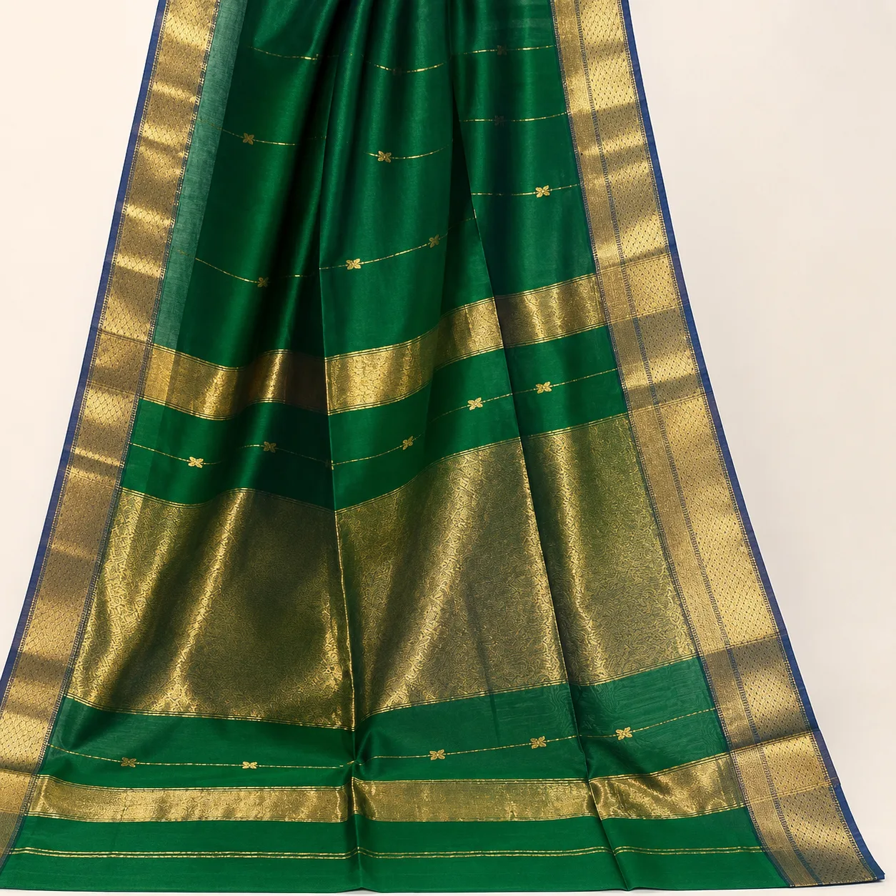 Emerald Green Chanderi Pattu Saree with Golden Zari Border Description: