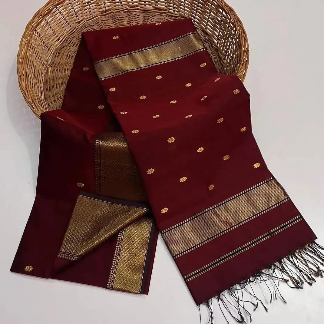 Maheshwari Pure Silk with small buttas and classic pallu.