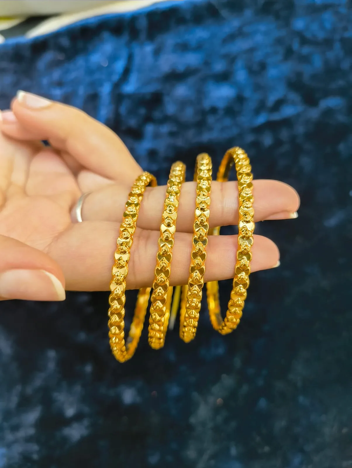 Elegant Gold-Tone Textured Bangles (Set of 4)