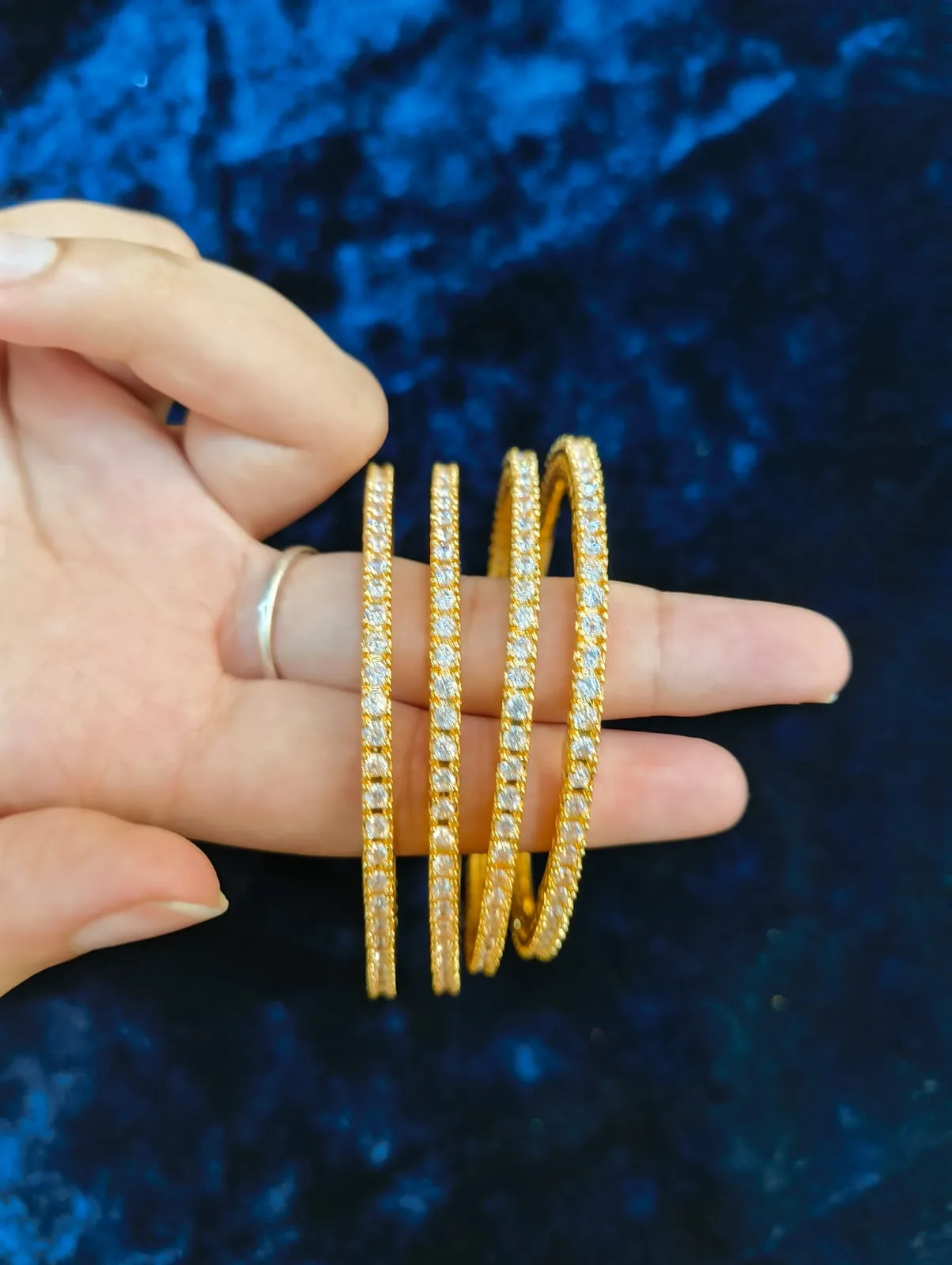 Elegant American Diamond Gold-Tone Bangles (Set of 4)