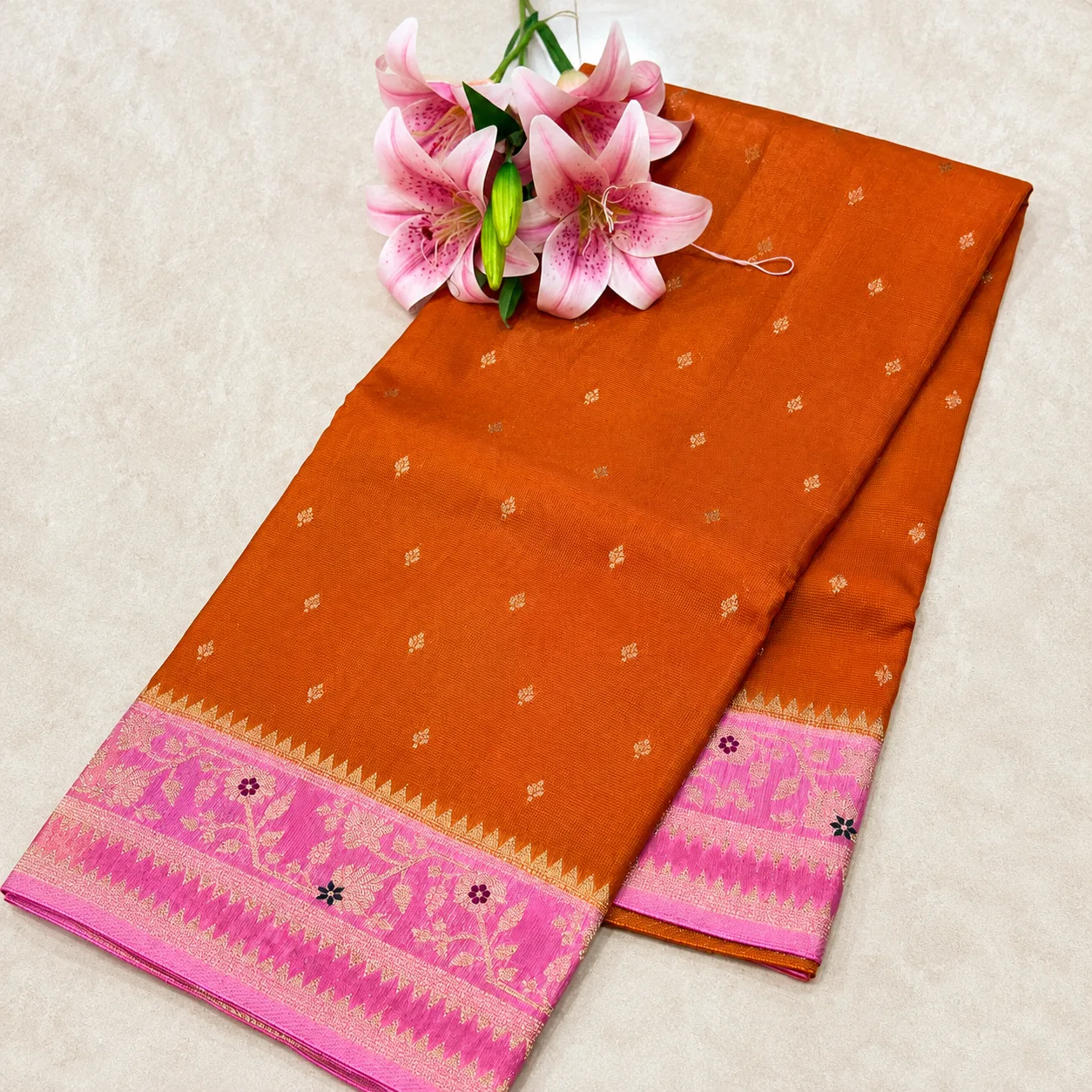 Rust Orange Saree with Pink Zari Floral Border