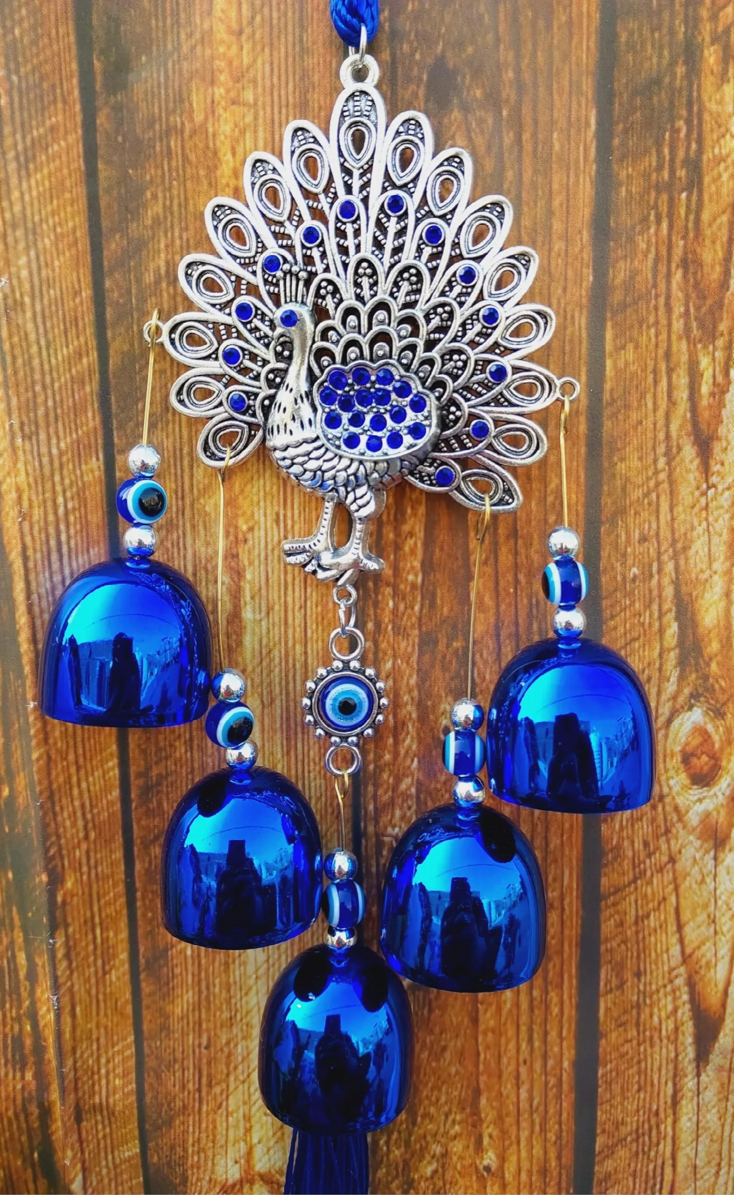 Decorative hanging wind chime with bells and tassels