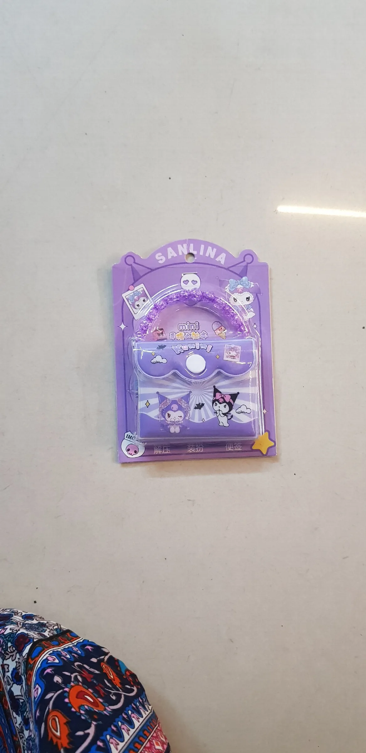 Kuromi-themed mini handbag or portable notebook
