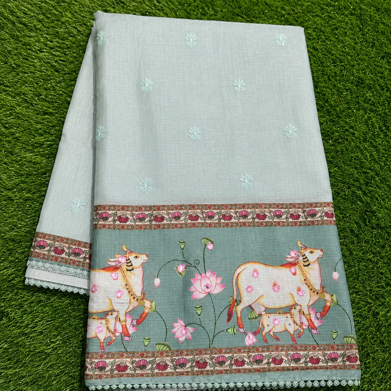 Pastel Green Linen Cotton Saree with Cow and Lotus Print Border